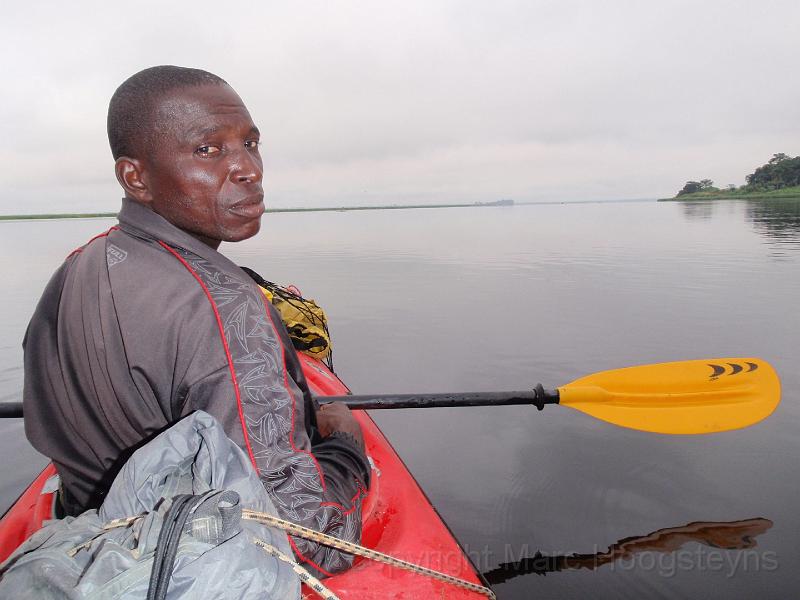 8 Francois in the front seat of the kayak on Kasai river.jpg